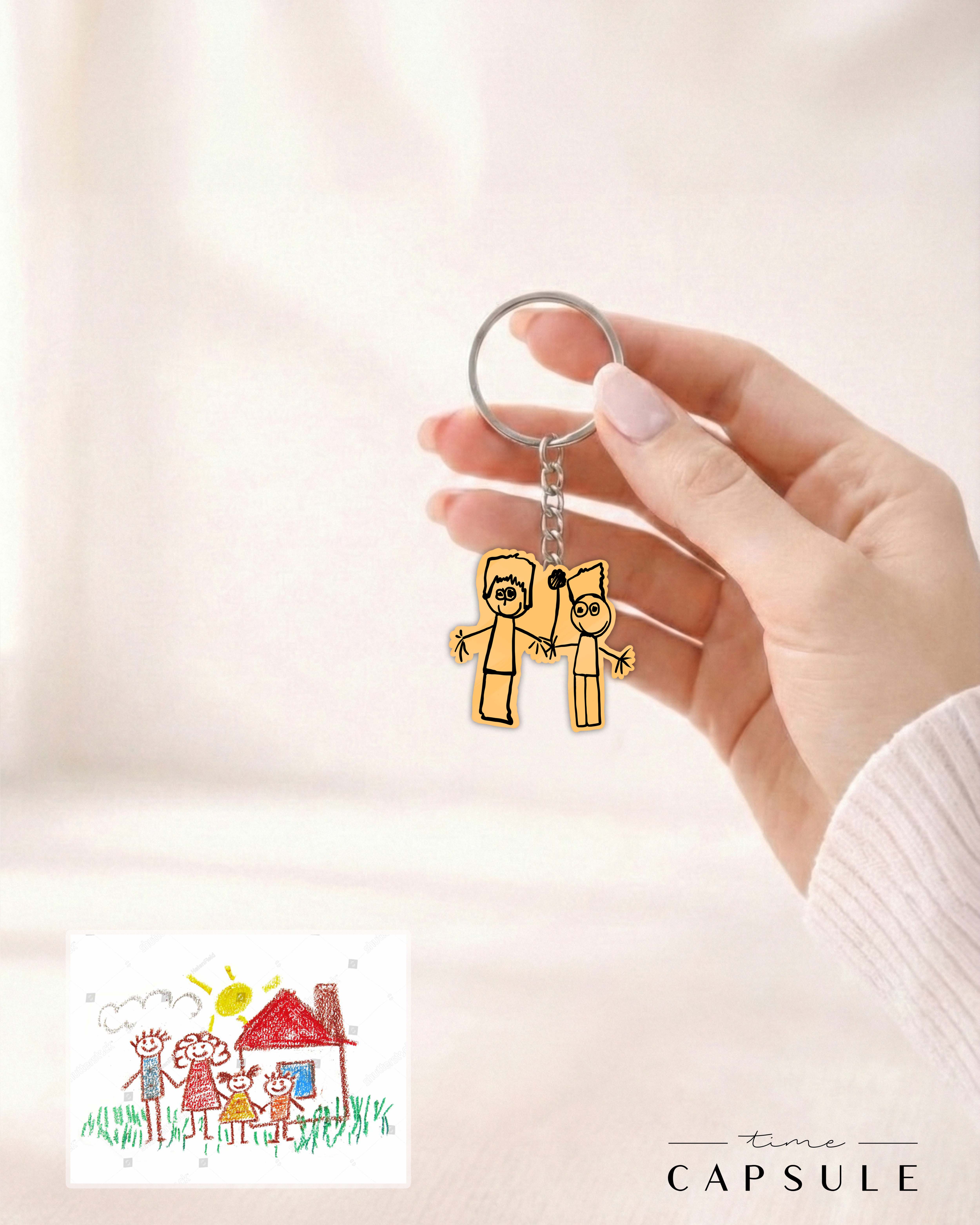 2 პერსონიანი მოოქროვილი ვერცხლის ბრელოკი ნახატიდან