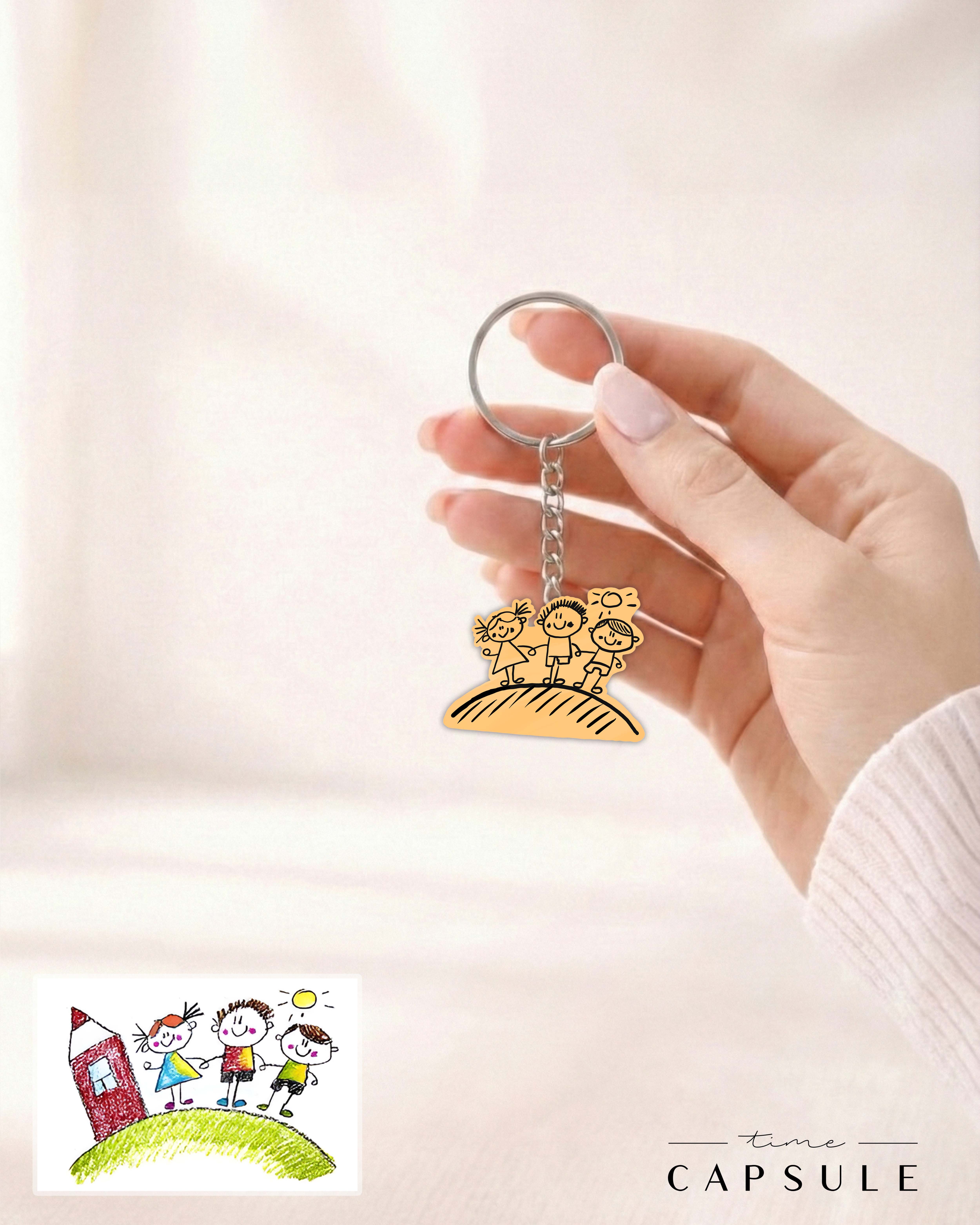 3 პერსონიანი მოოქროვილი ვერცხლის ბრელოკი ნახატიდან