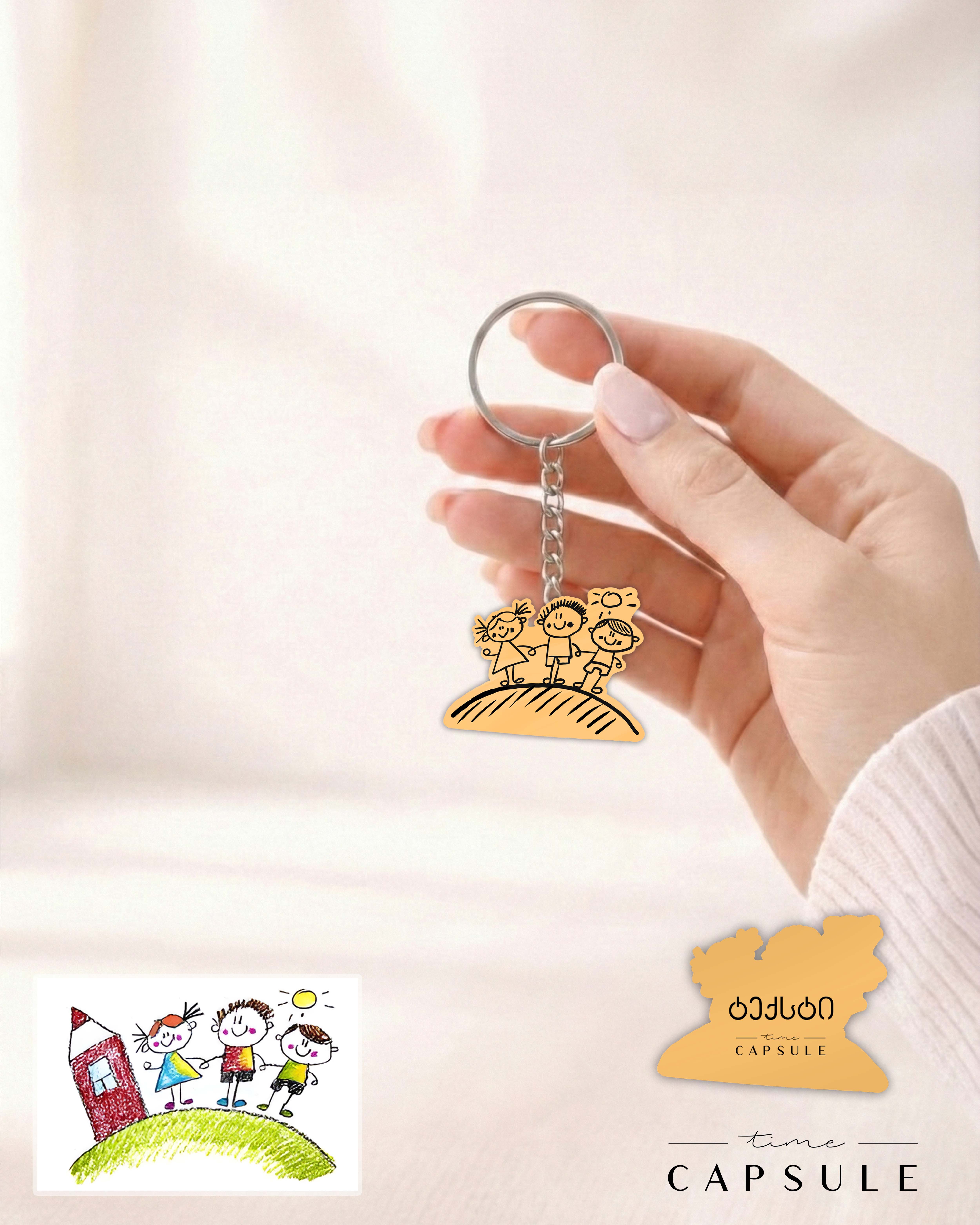 3 პერსონიანი მოოქროვილი ვერცხლის ბრელოკი ნახატიდან გრავირებით