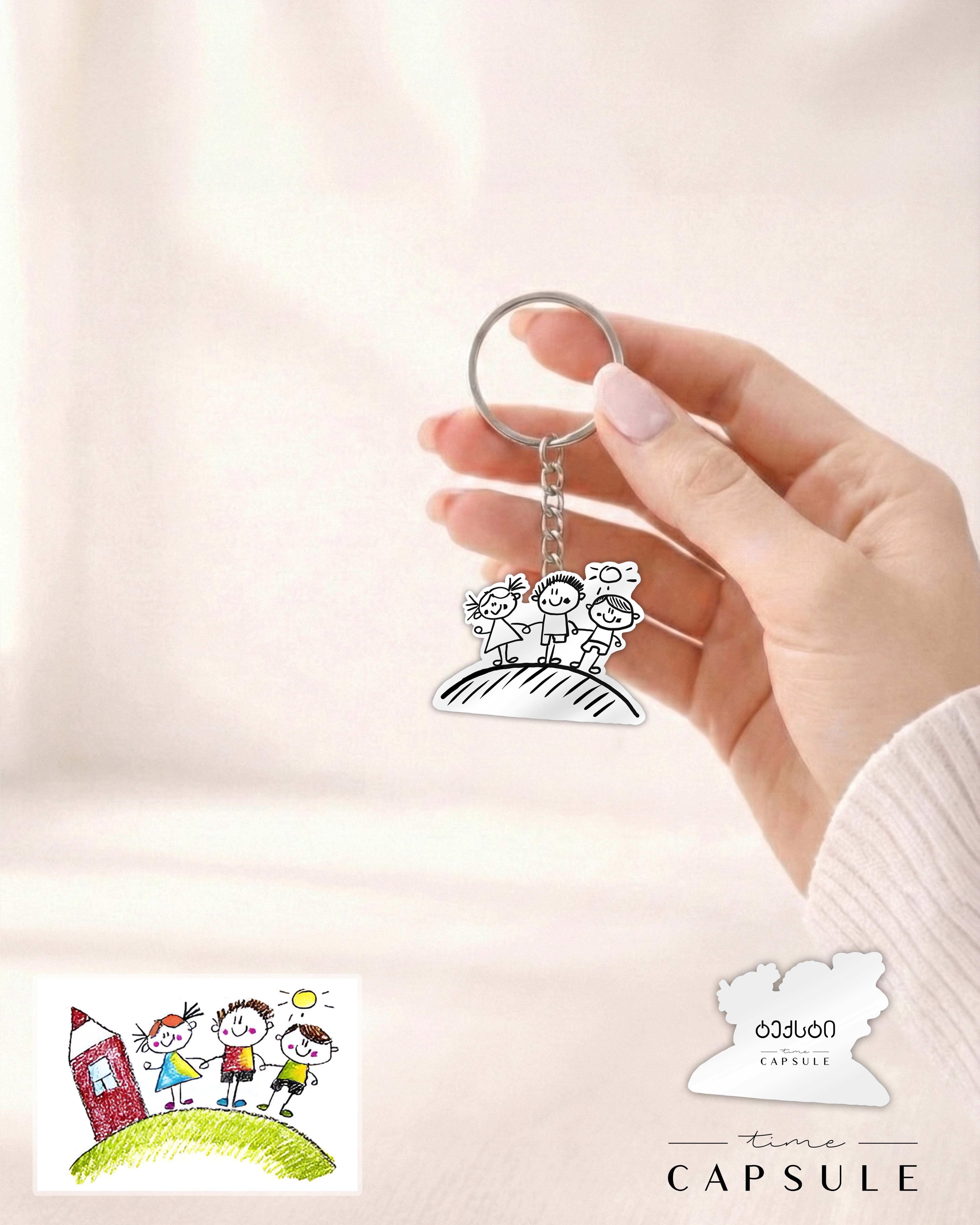 3 პერსონიანი ვერცხლის ბრელოკი ნახატიდან გრავირებით